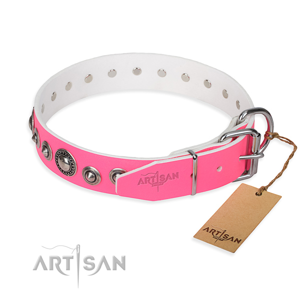 Genuine leather dog collar made of soft to touch material with corrosion resistant adornments
